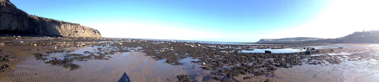 Panoramic shot of whitby beach against sky