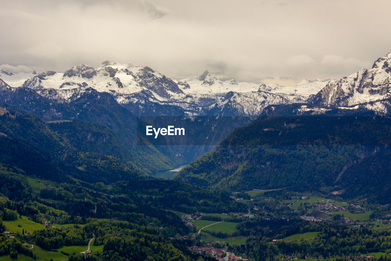 Scenic view of snowcapped mountains against sky