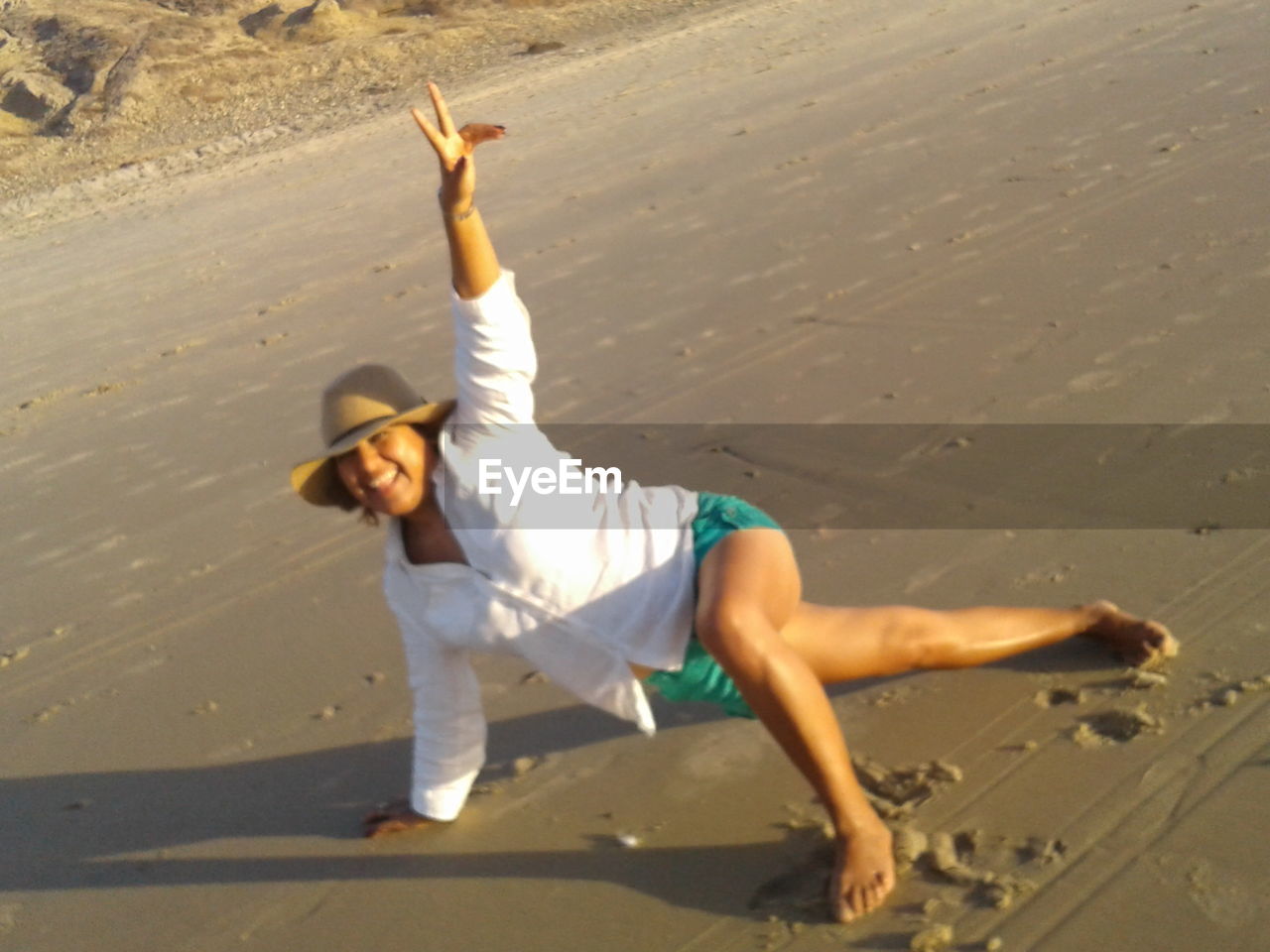 YOUNG MAN ON SAND