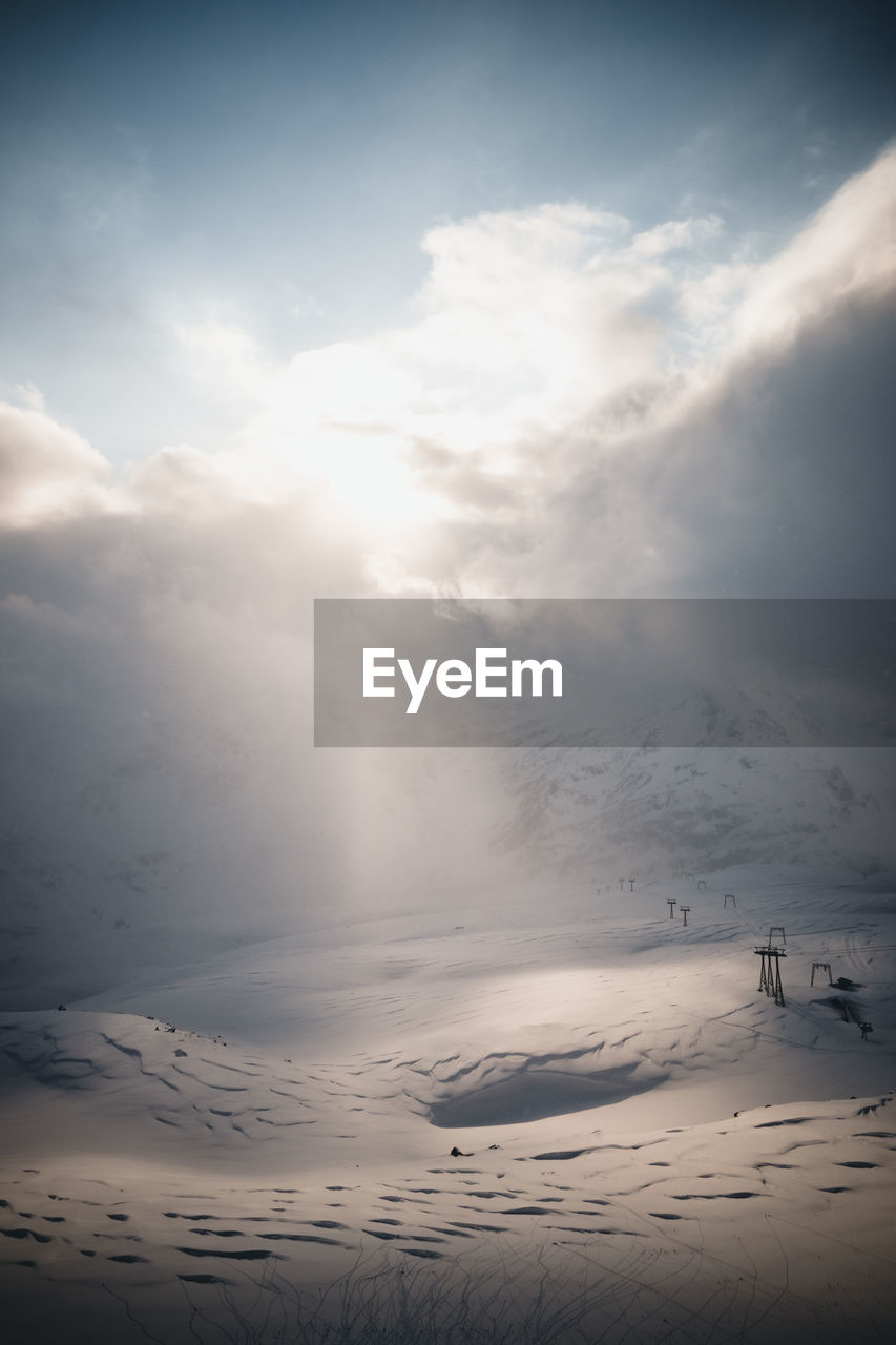 Golden sunset light illuminating winter wonderland in mountain region, gastein, salzburg, austria