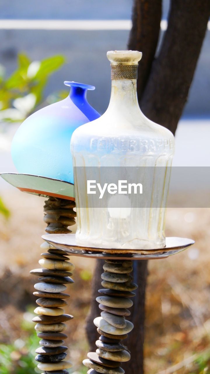 CLOSE-UP OF GLASSES ON TABLE