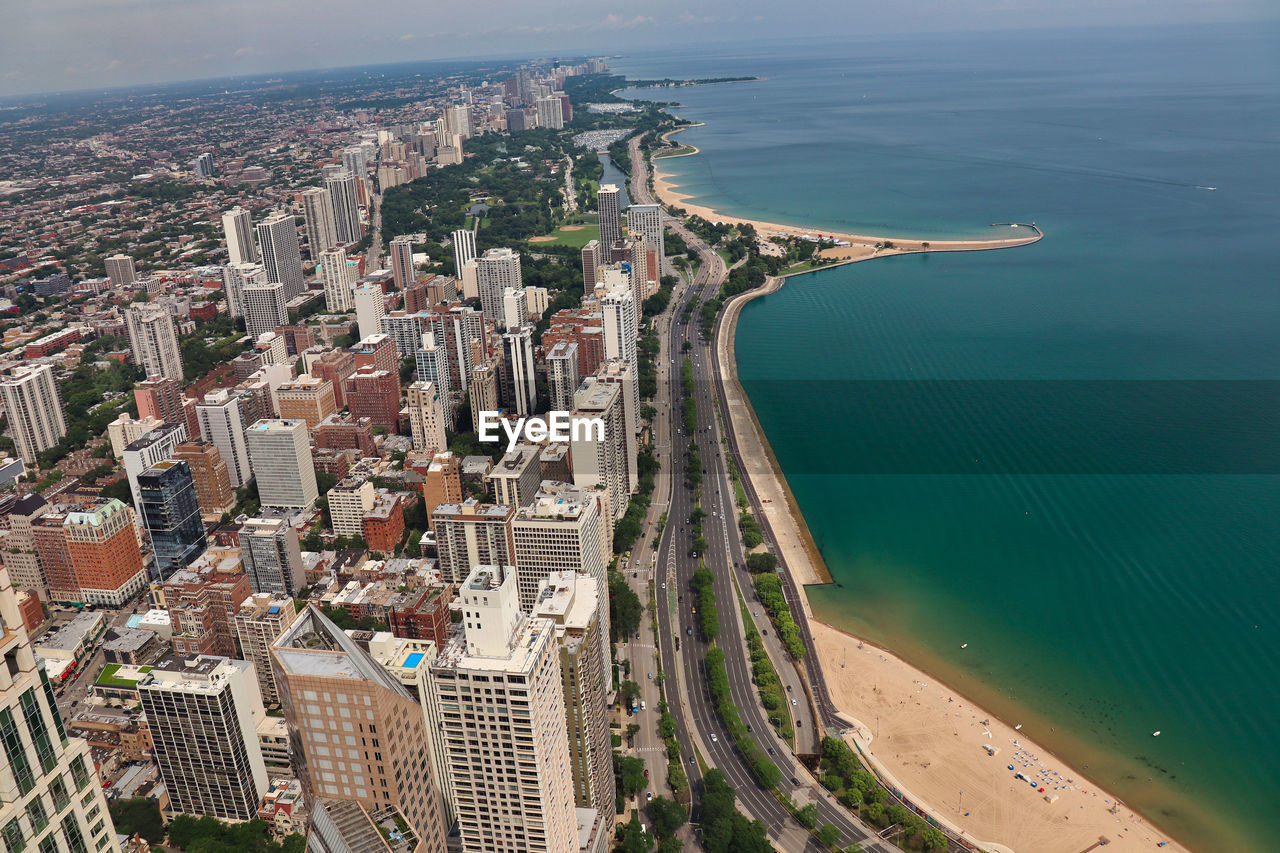 Lake shore drive - high angle view of city by sea against sky