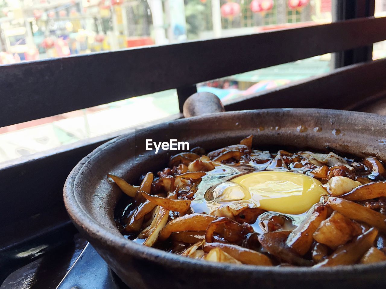 Close-up of fresh food in cooking pan at restaurant