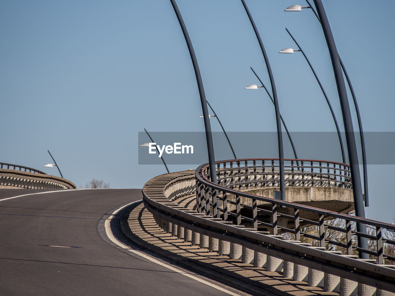 VIEW OF FOOTBRIDGE AGAINST CLEAR SKY