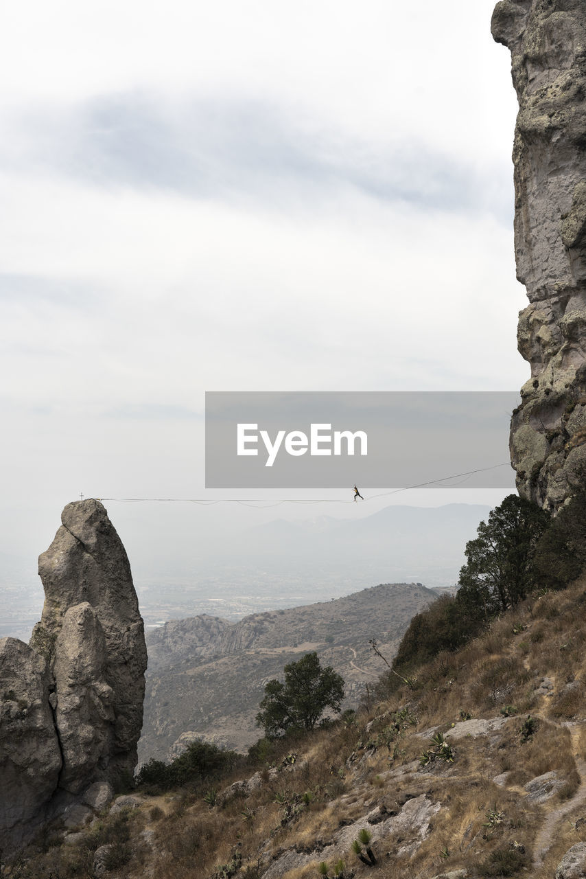 One person poses balancing in a highline at los frailes