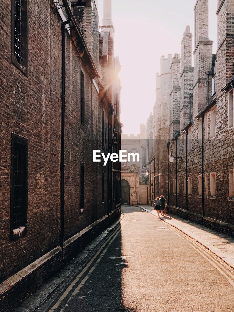 Street amidst buildings in city against sky