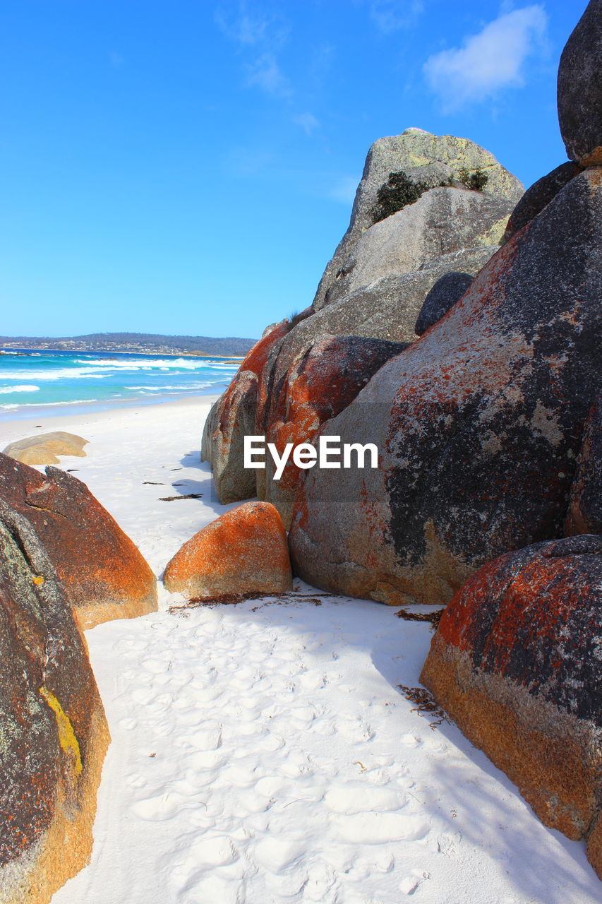 Scenic view of beach against sky during winter