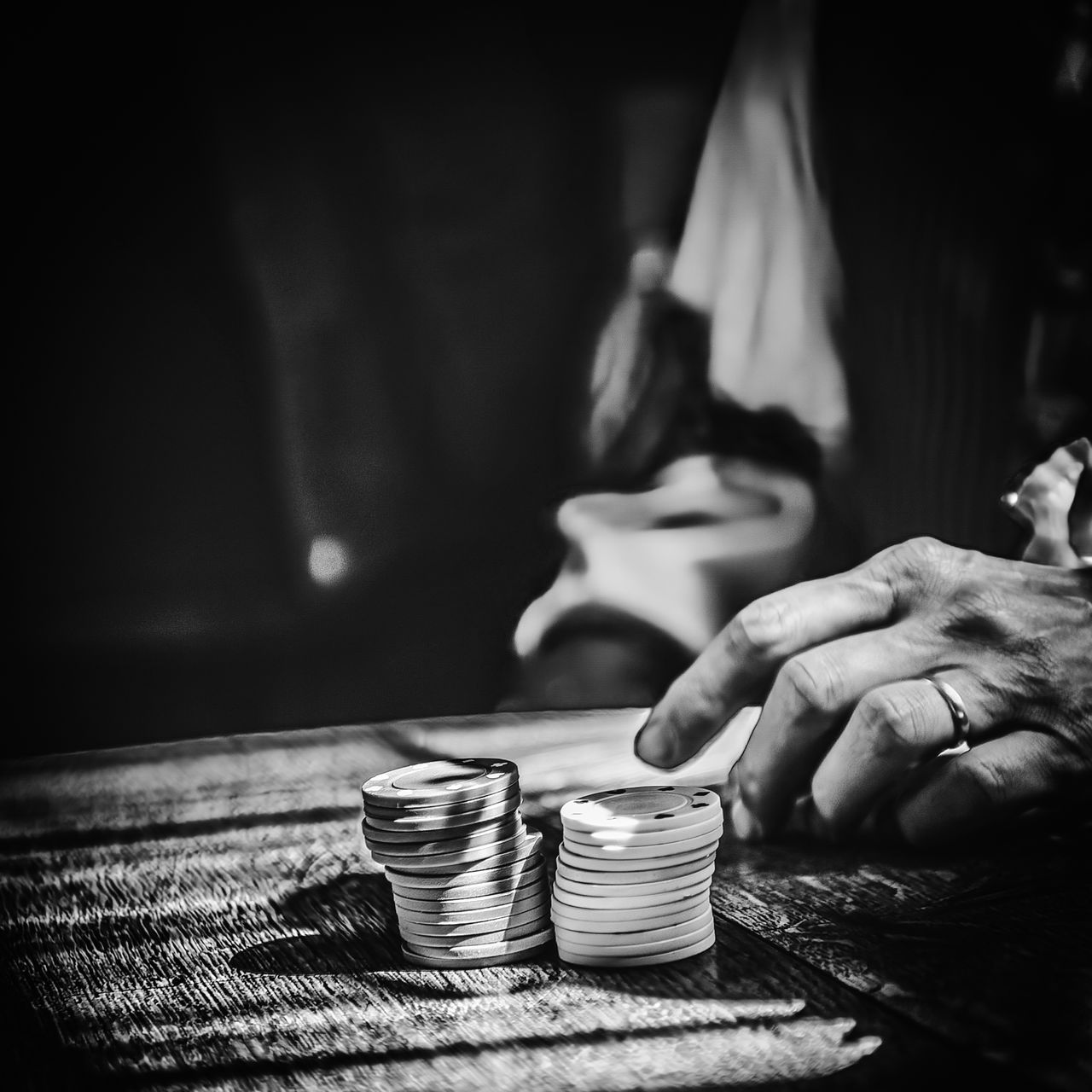 black, darkness, hand, white, adult, one person, table, indoors, food and drink, black and white, monochrome photography, monochrome, social issues, focus on foreground, men, person, holding, drink, finance, women, lifestyles