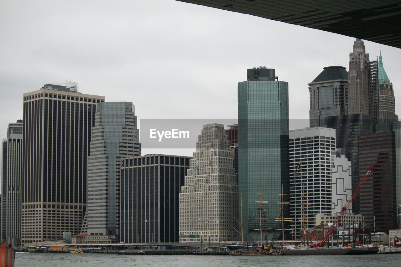 Modern buildings in city against sky