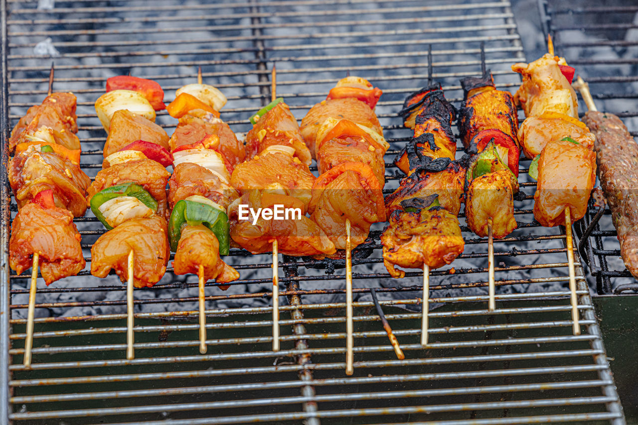 Close-up of chicken shish kebab on a barbecue