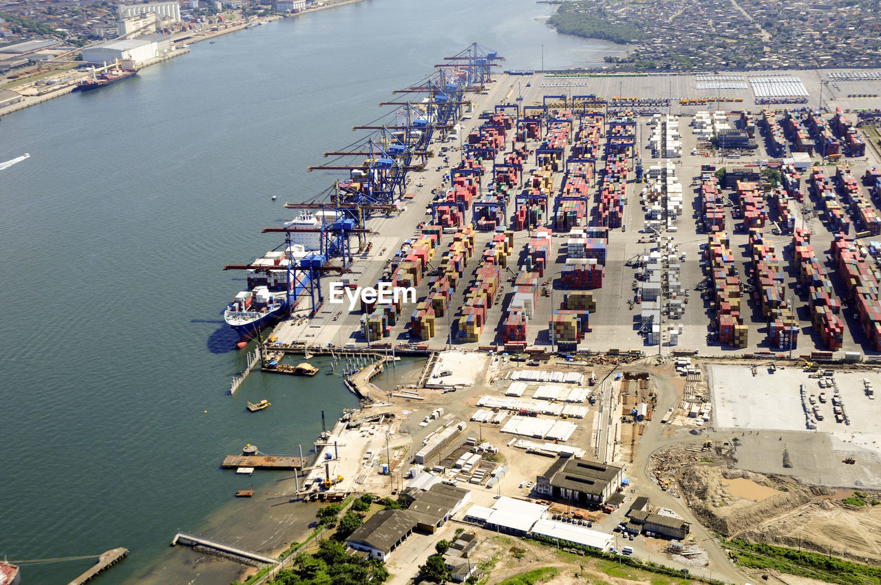 HIGH ANGLE VIEW OF BOATS AT HARBOR