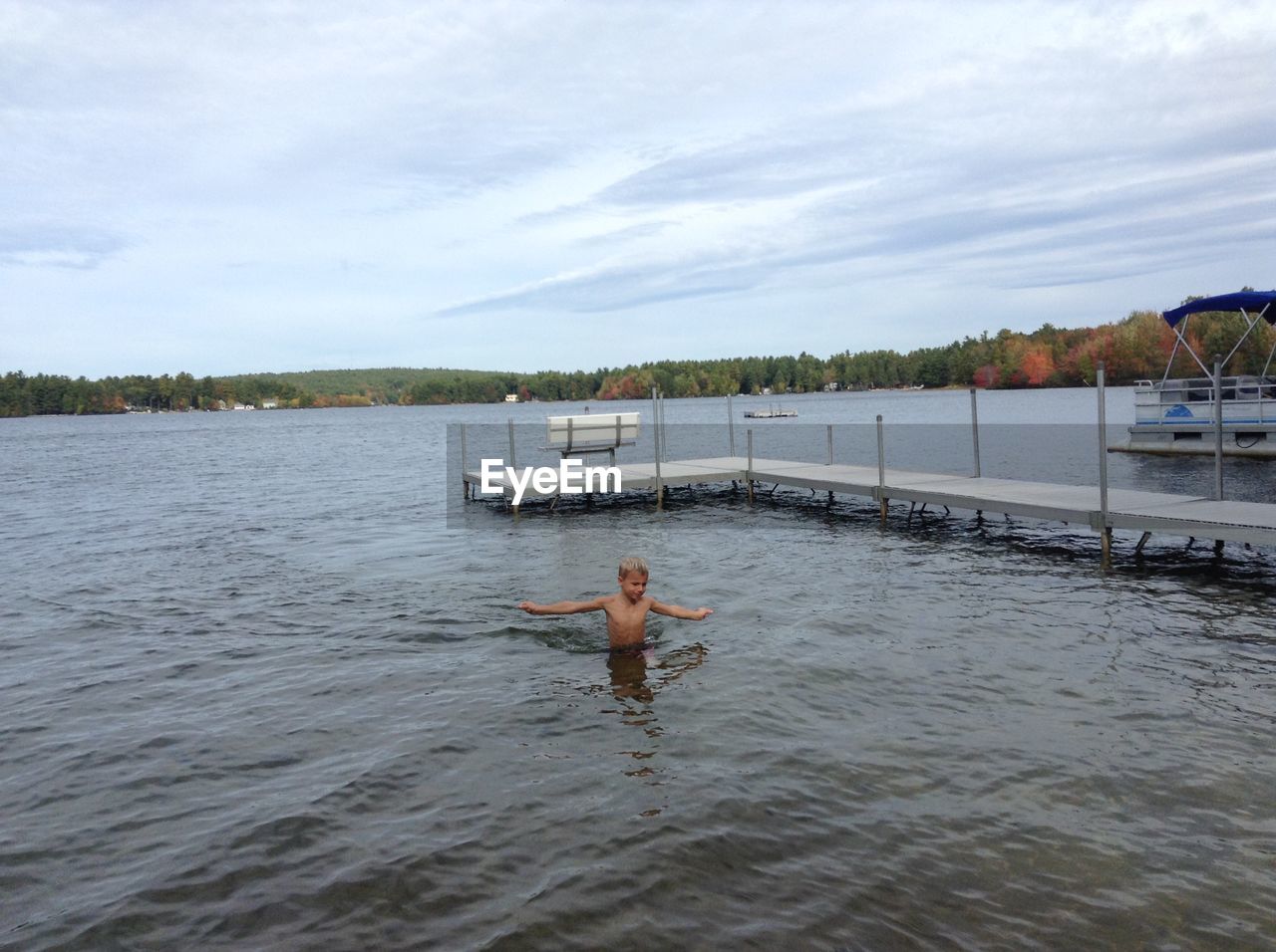 WOMAN STANDING IN WATER