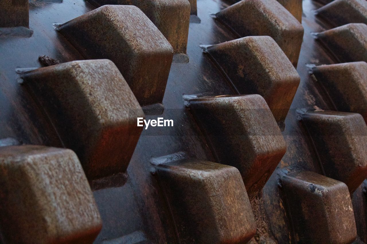 Full frame shot of wooden blocks on single-drum road roller