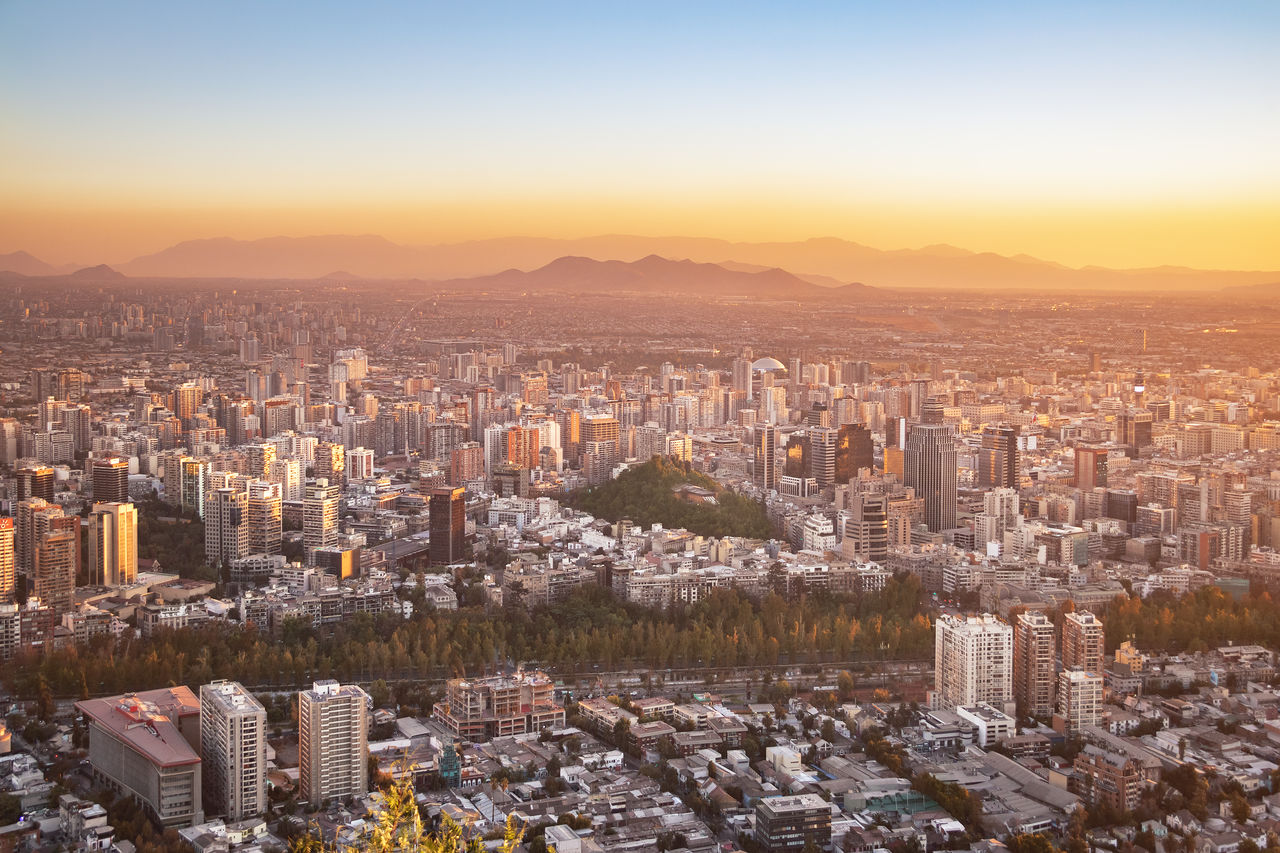 high angle view of cityscape against sky during sunset