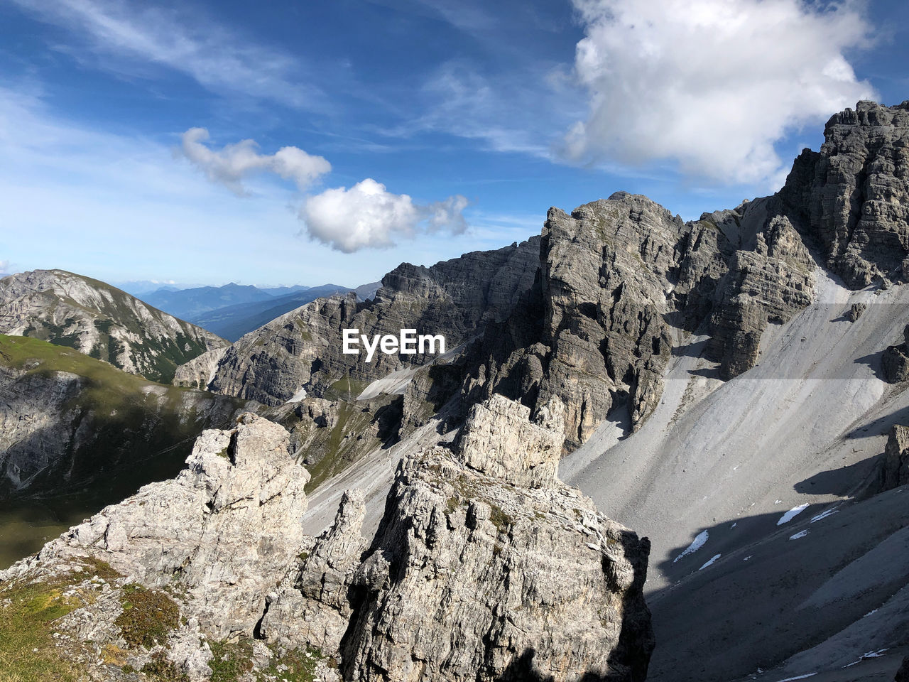 Panoramic view of rocky mountains against sky