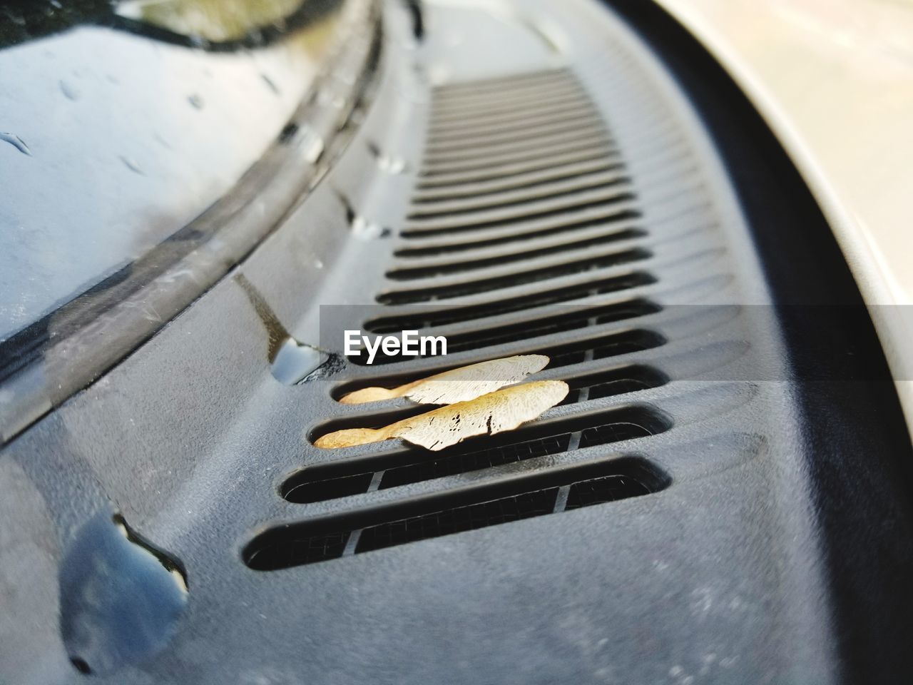 CLOSE-UP HIGH ANGLE VIEW OF CAR