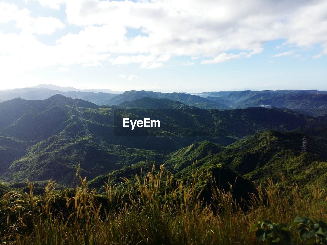 SCENIC VIEW OF MOUNTAIN AGAINST SKY