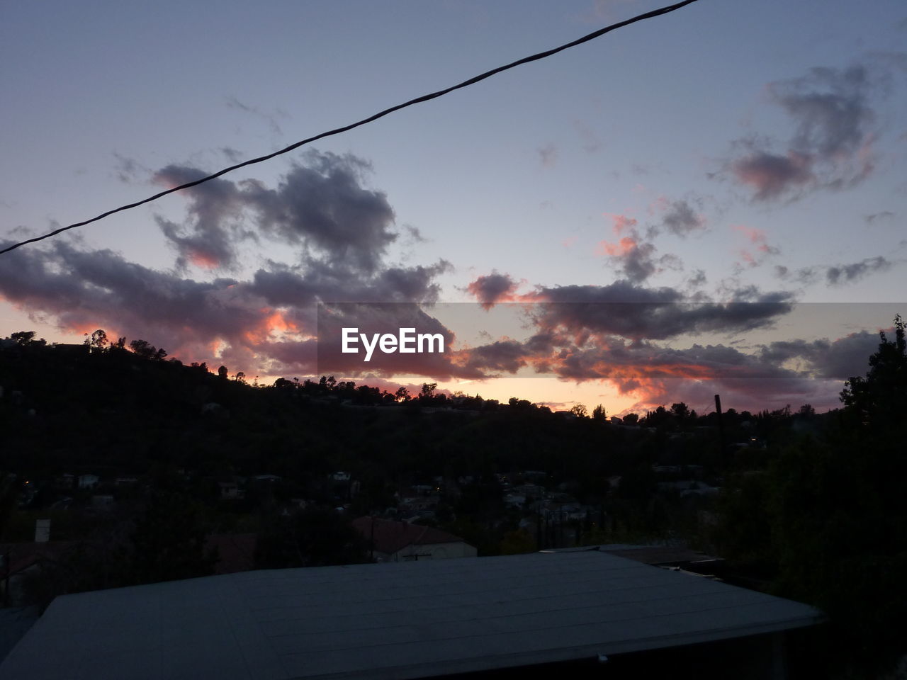 VIEW OF LANDSCAPE AT SUNSET