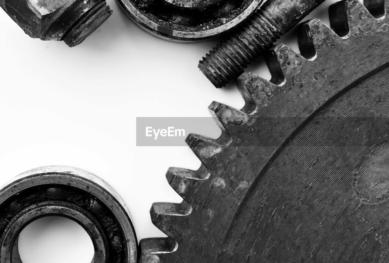 Close-up of machine parts on table