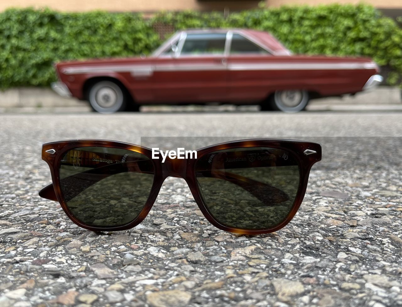 glasses, fashion, sunglasses, eyewear, car, vision care, day, transportation, city, motor vehicle, outdoors, mode of transportation, no people, close-up, reflection, focus on foreground, nature, fashion accessory
