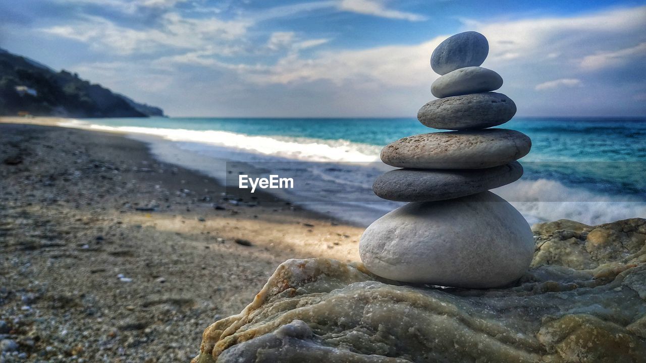 STACK OF STONES ON SHORE