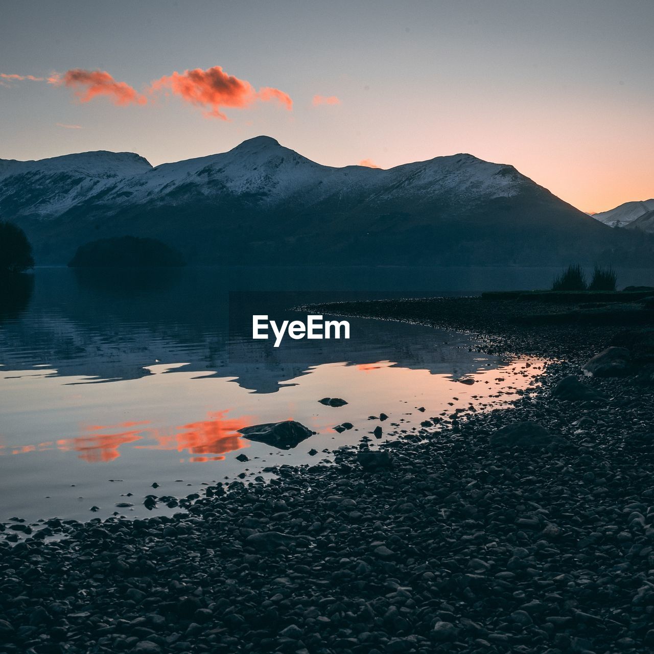 View of lake against sky during sunset