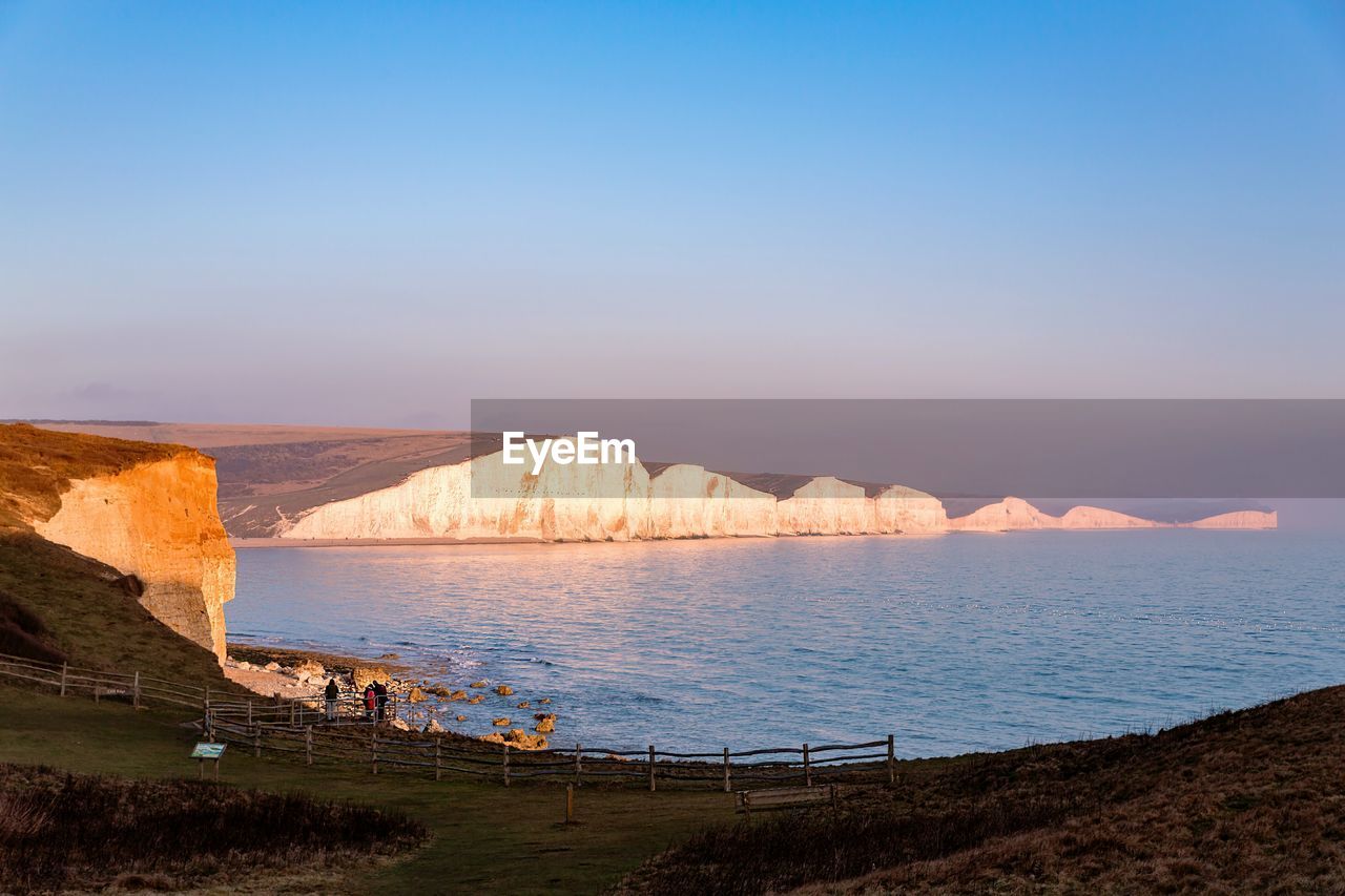 Scenic view of sea against blue sky