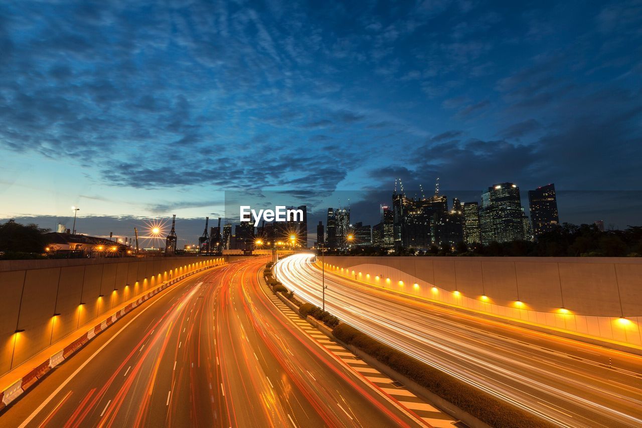 High angle view of light trails on road at night