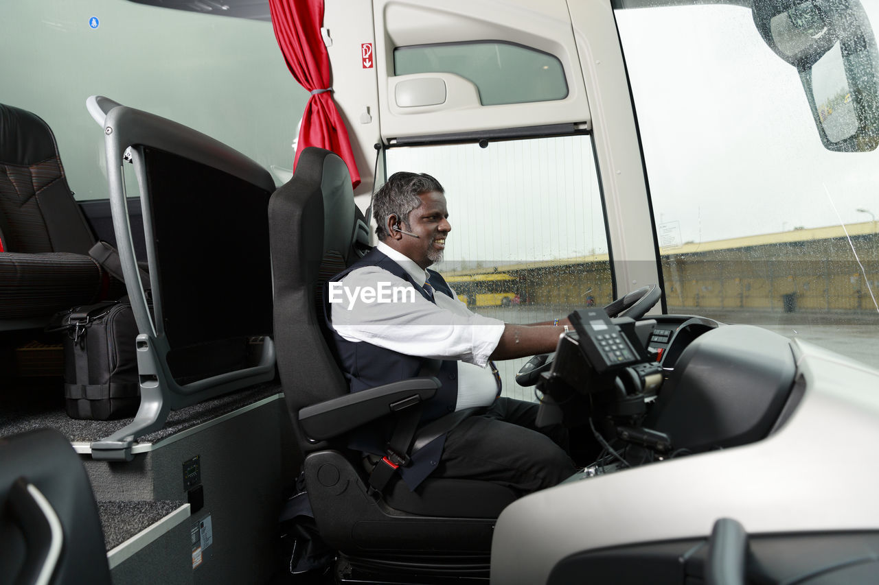 Driver driving bus