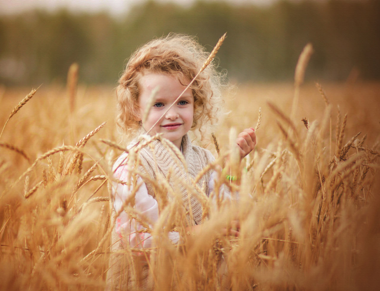 Girl standing on field