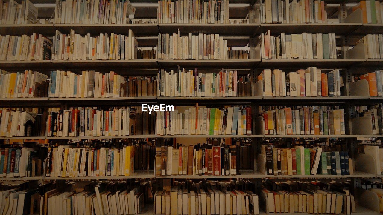 Full frame shot of bookshelves in library