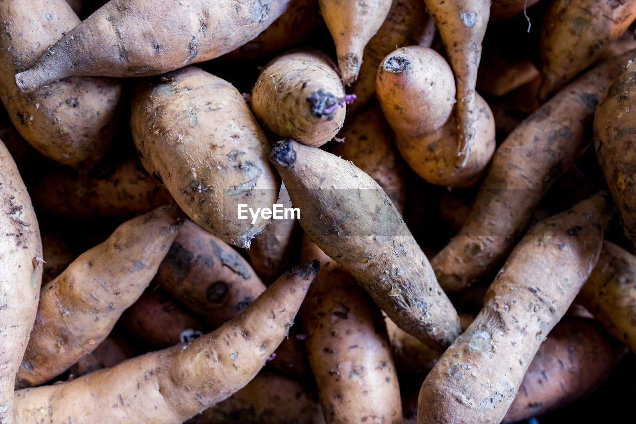 Fresh sweet potato sold at local market stall