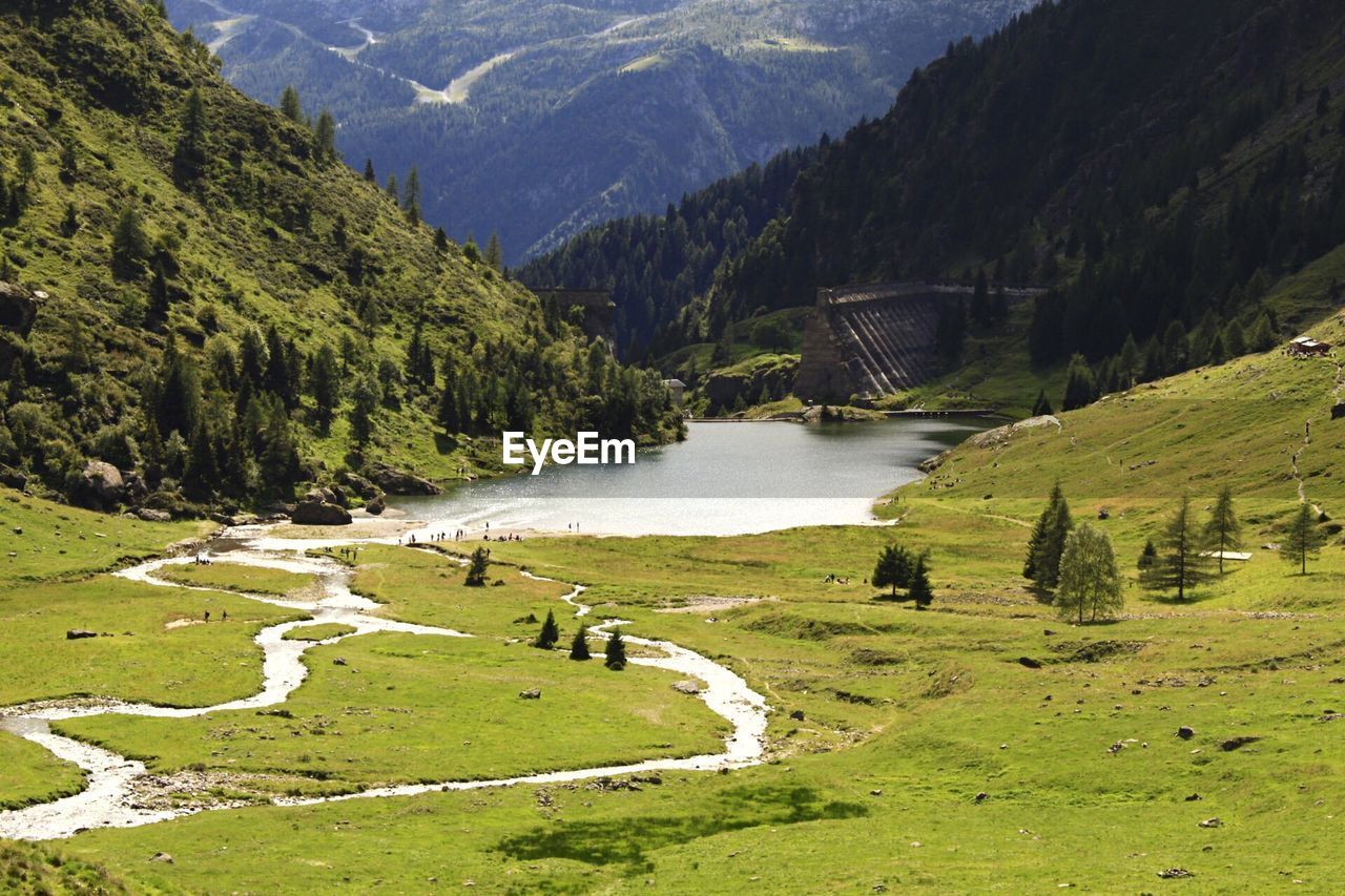 High angle view of river amidst mountains