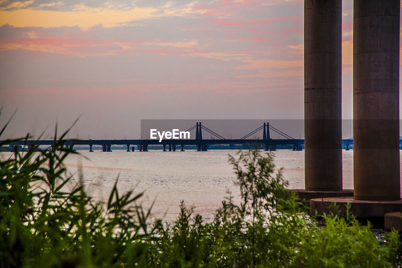 VIEW OF BUILT STRUCTURE AT SUNSET