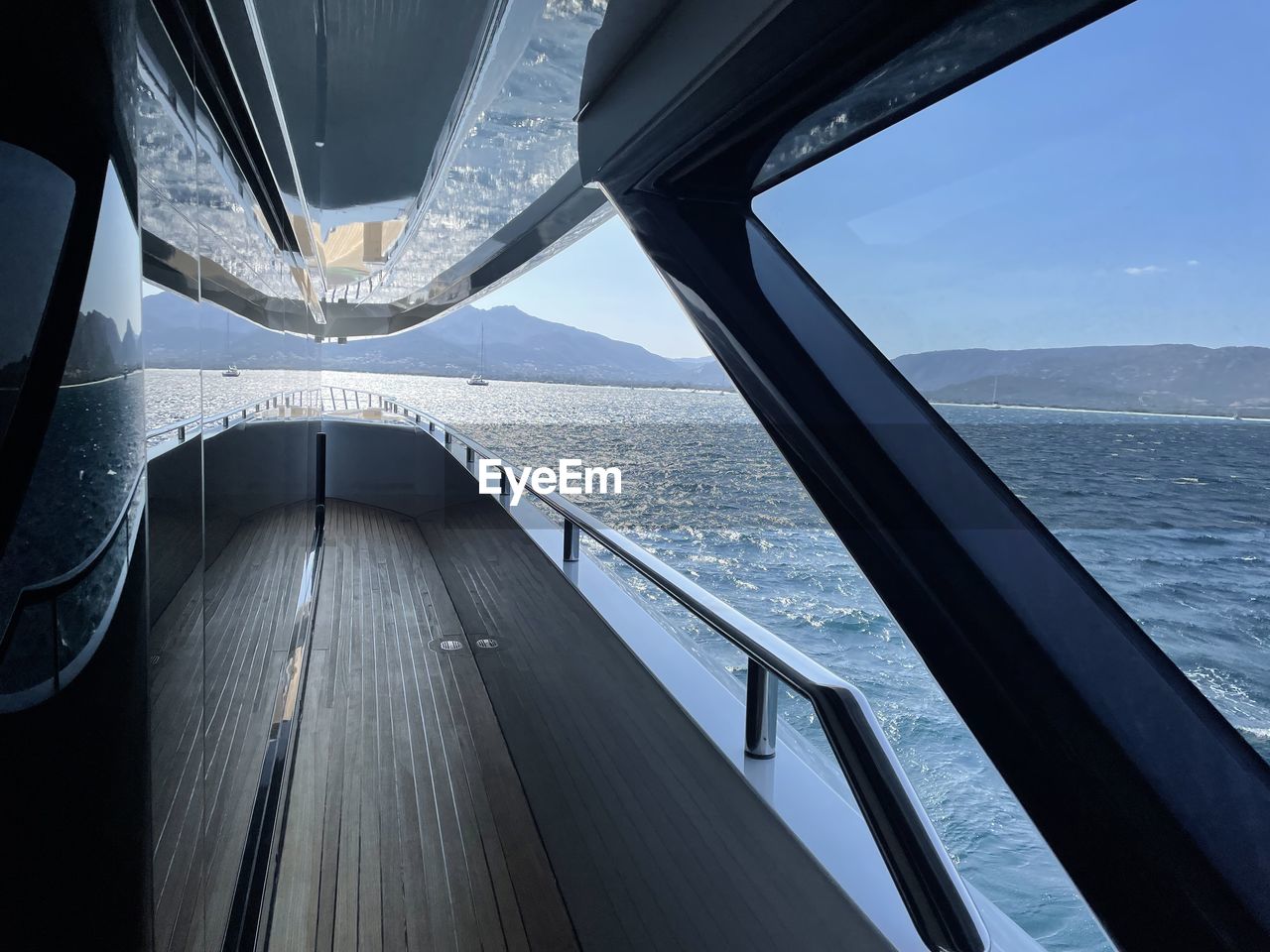 LOW ANGLE VIEW OF BRIDGE OVER SEA AGAINST SKY