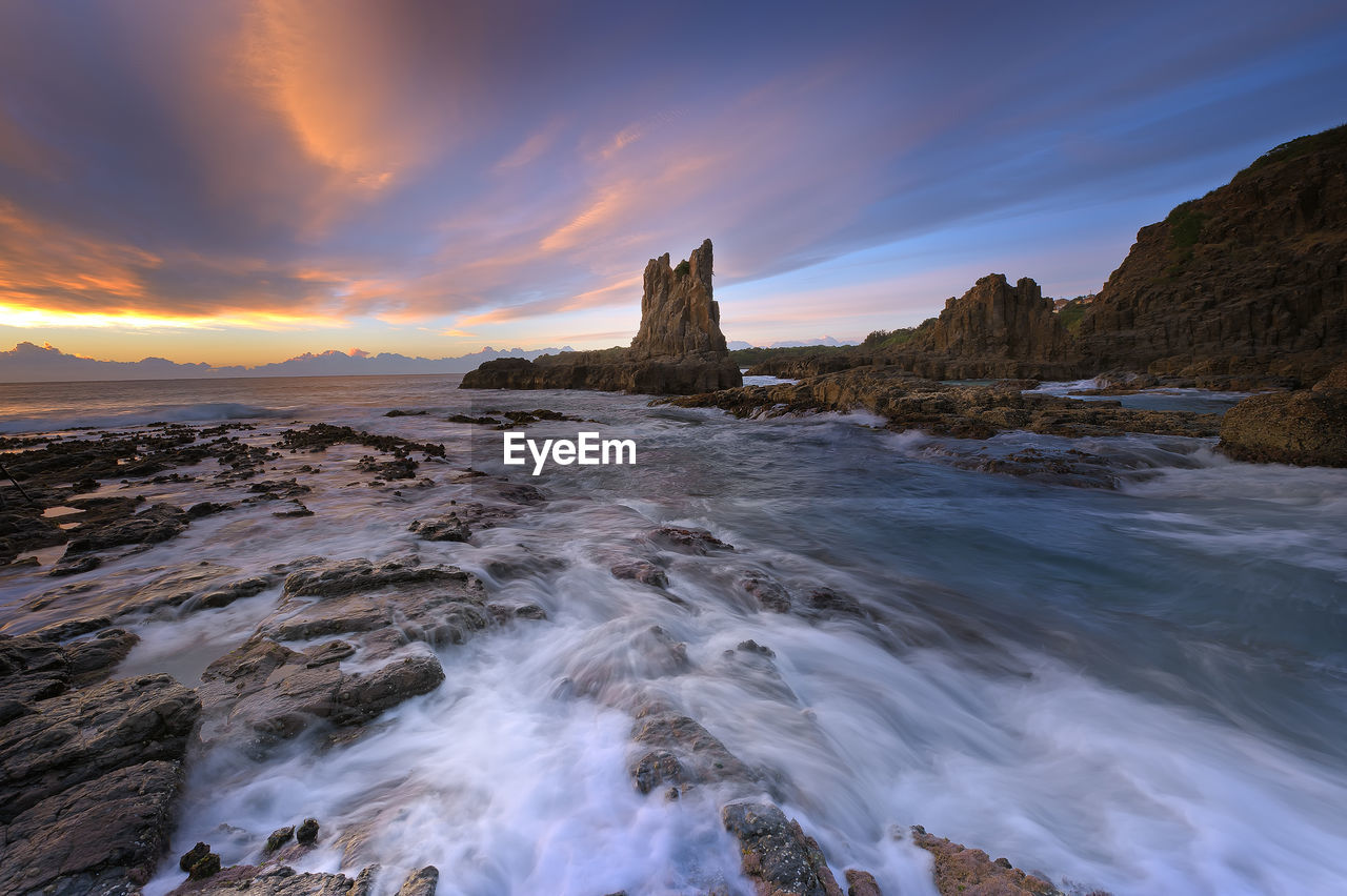 Scenic view of sea against sky during sunset