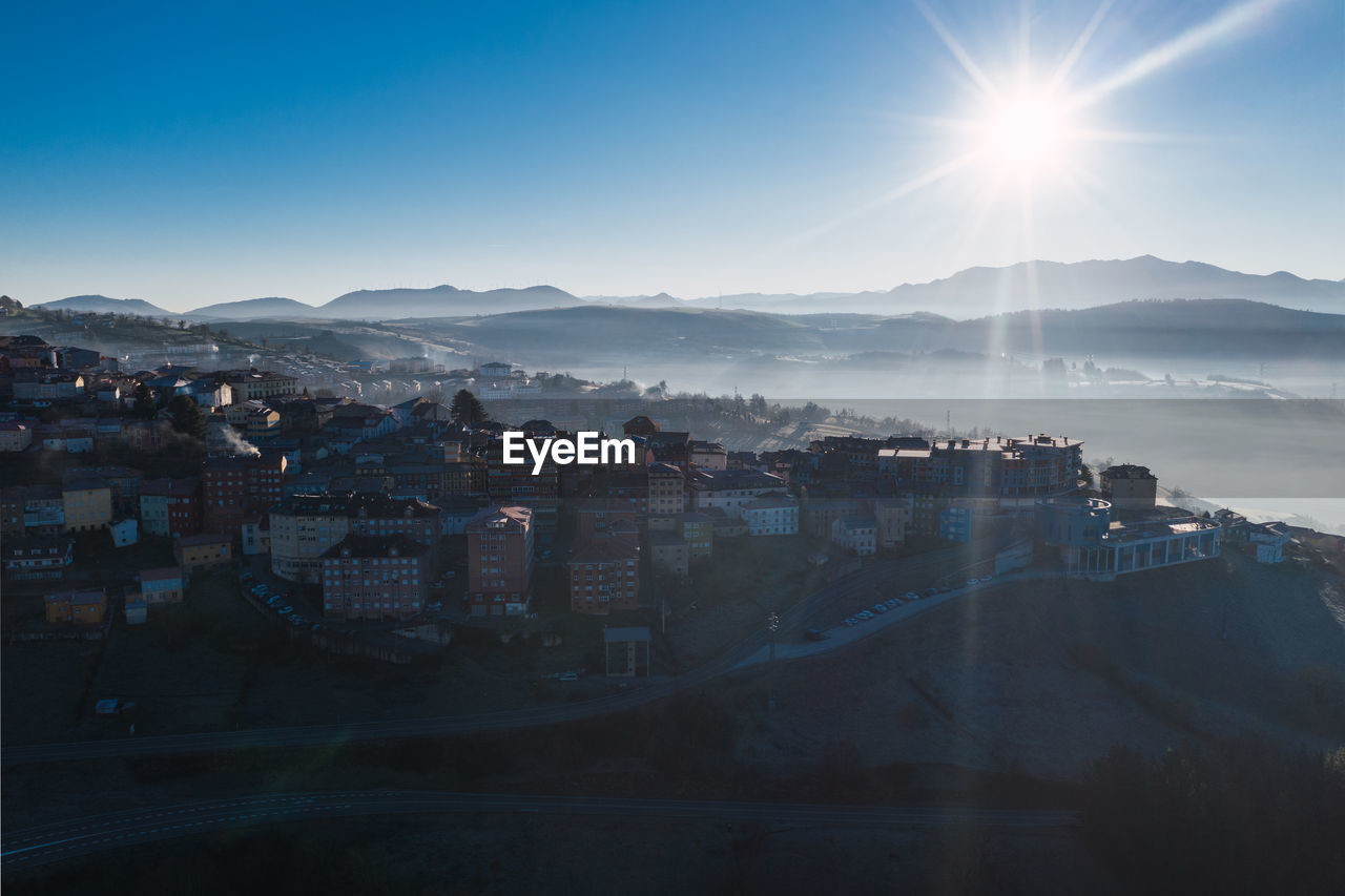 View of buildings in city against sky