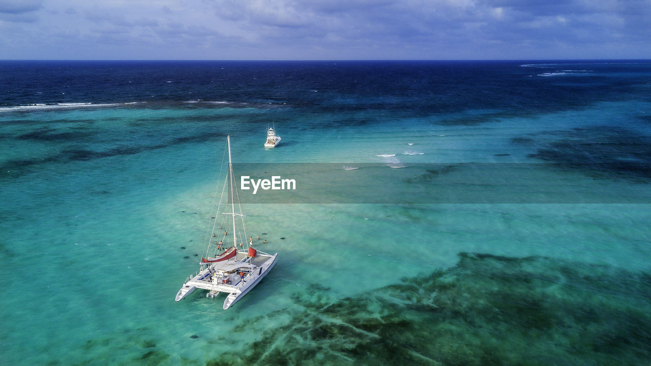 High angle view of sailboat in sea against sky