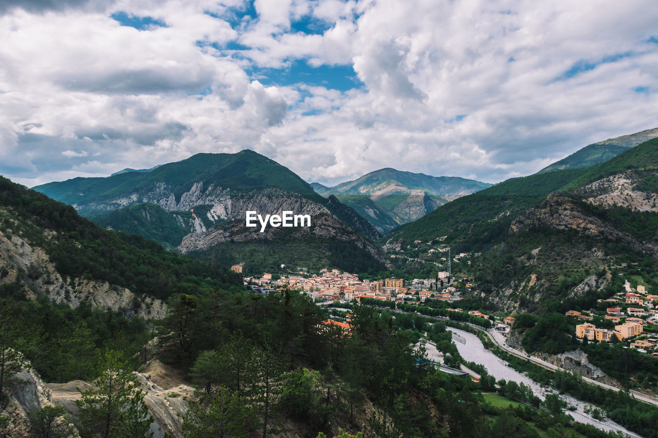 Aerial view of townscape amidst valley