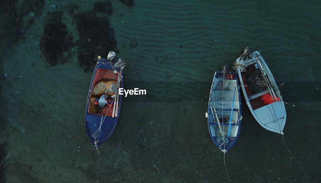 High angle view of boat moored in lake