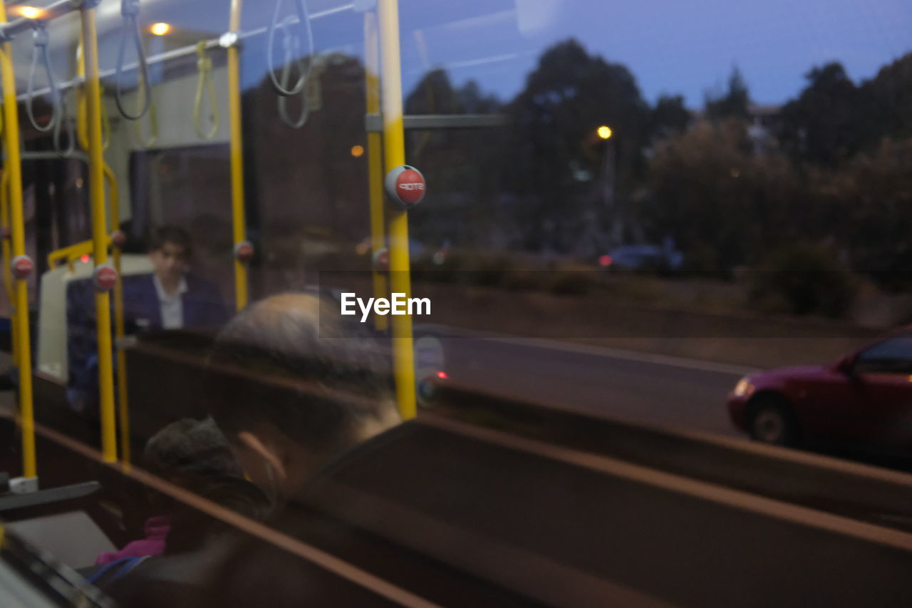 ROAD SEEN THROUGH CAR WINDOW