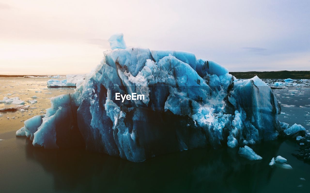 Panoramic shot of frozen sea against sky