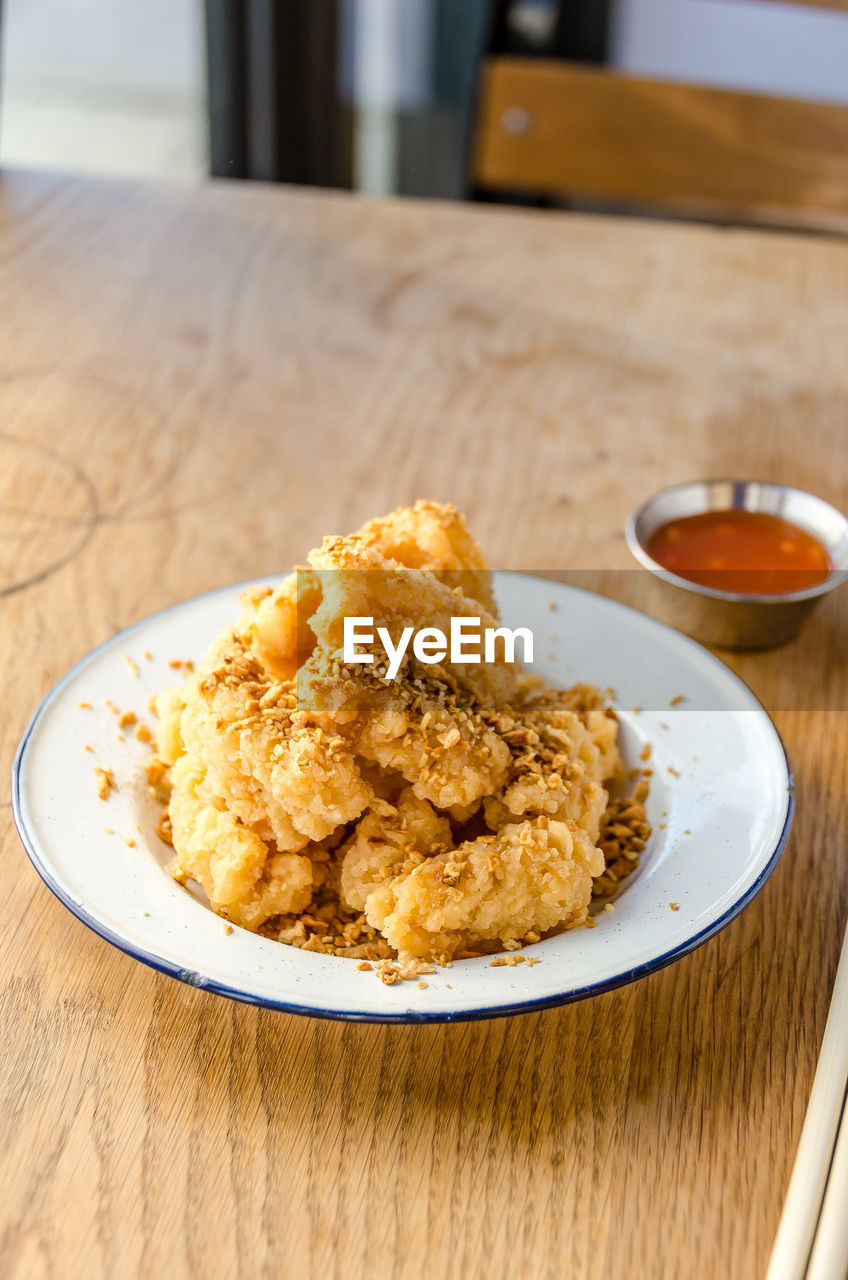 High angle view of meat in plate on table