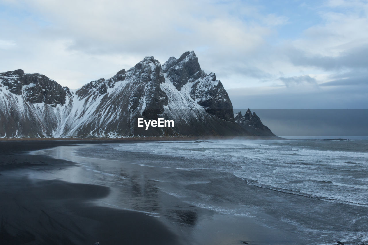 Scenic view of frozen sea against sky