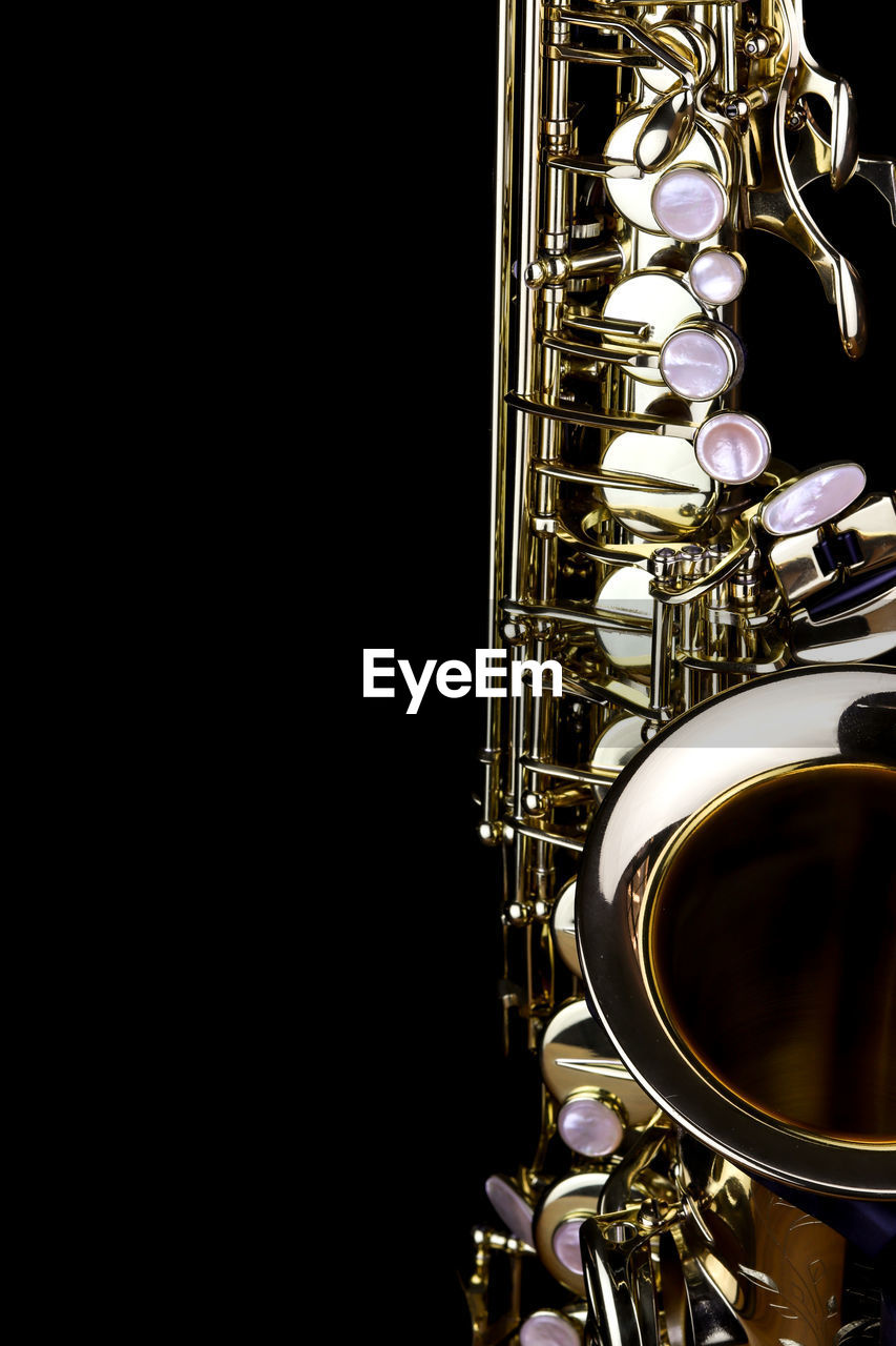 Close-up of musical equipment against black background