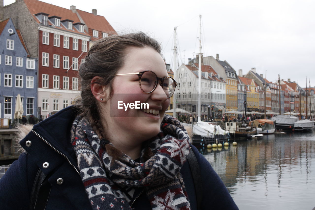 Smiling woman in city