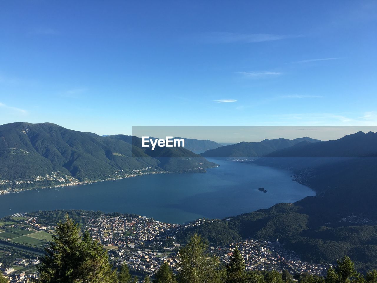 SCENIC VIEW OF MOUNTAINS AND BLUE SKY