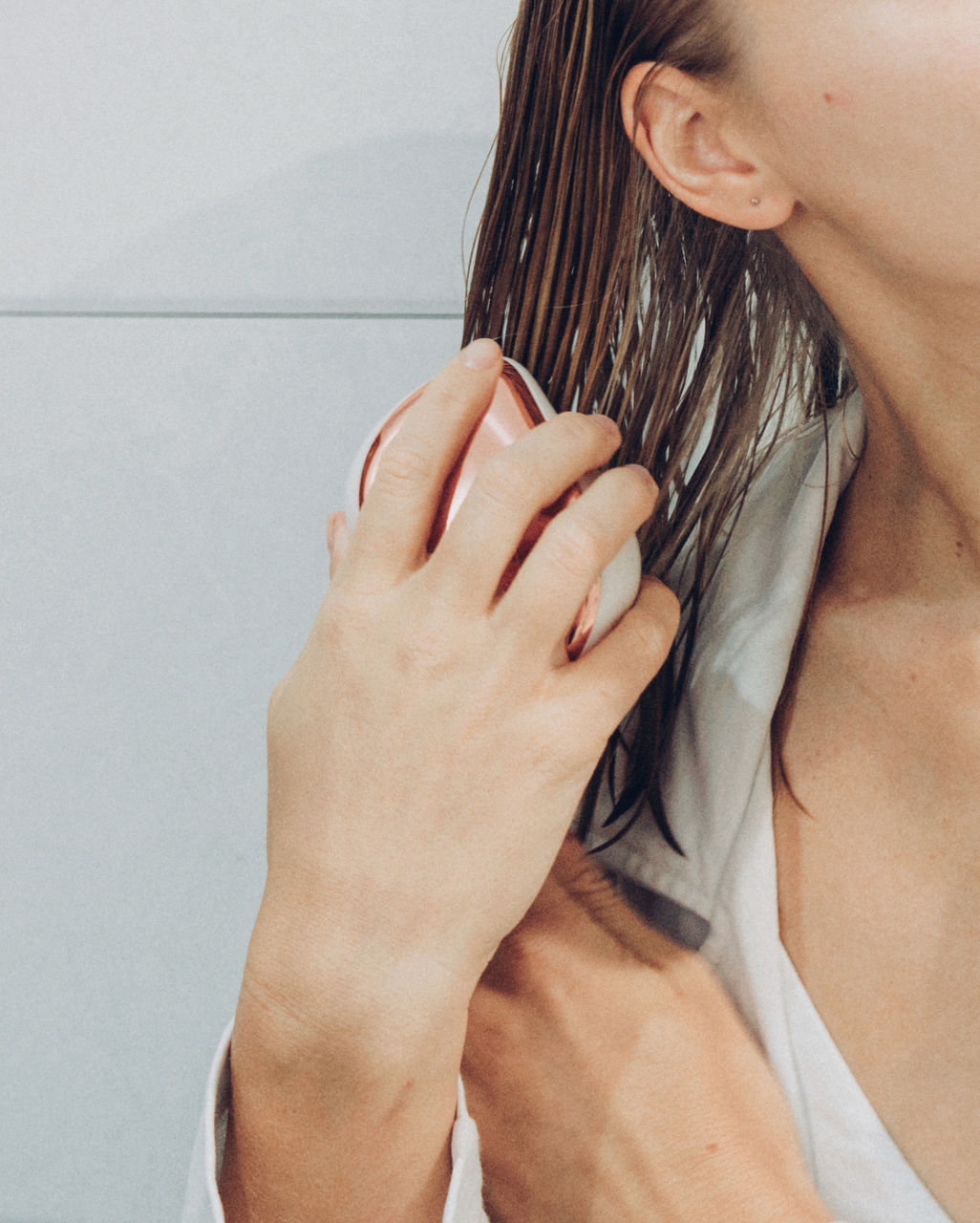 Woman brushing her hair