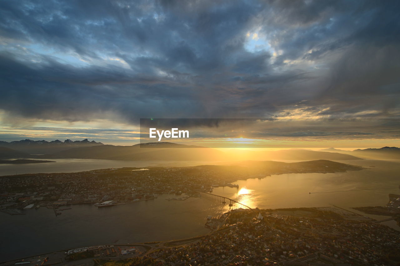 SCENIC VIEW OF SUNSET OVER LANDSCAPE