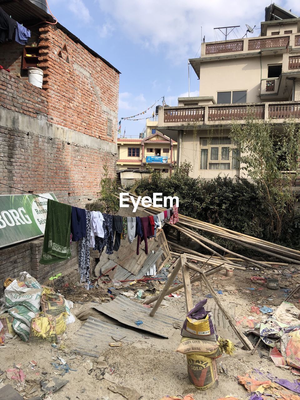 CLOTHES DRYING BY BUILDINGS IN CITY